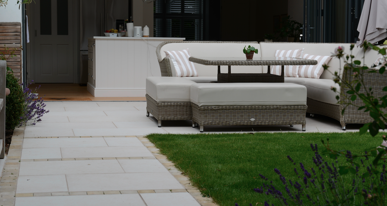 Patio garden with large format paving and outdoor seating area — garden construction by Will Draper, Norfolk